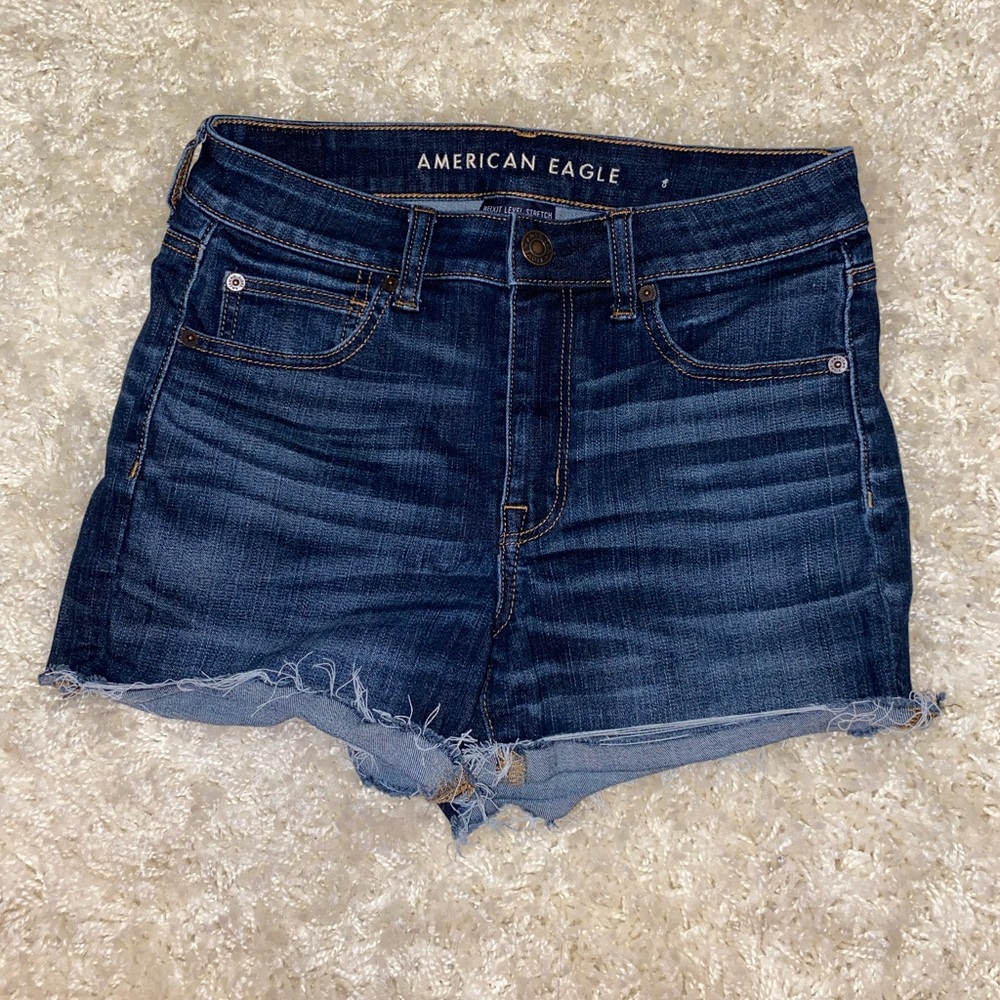 Dark wash, next level stretch, mid rise shorts, size 6